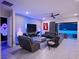 Relax in this cozy living room, featuring modern furnishings, a sleek TV, and a cozy atmosphere at 270 Shaded Canyon Dr, Henderson, NV 89012