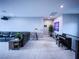 Spacious loft area with a comfortable seating area and a piano at 270 Shaded Canyon Dr, Henderson, NV 89012