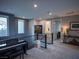 Bright loft space with a piano, natural light, and views at 270 Shaded Canyon Dr, Henderson, NV 89012