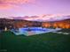 Relaxing backyard oasis with a pool, spa, and comfortable seating, ideal for enjoying the outdoors at 270 Shaded Canyon Dr, Henderson, NV 89012