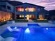 Backyard pool with spa, lounge chairs, and covered patio offers a perfect entertainment space at 270 Shaded Canyon Dr, Henderson, NV 89012
