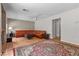 This is a wide angle view of the living room with wood floors and a brick fireplace at 2716 Timber Crossing Ct, Henderson, NV 89074