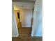 Hallway showing doorways to other rooms and wood-look flooring at 2750 S Durango Dr # 1080, Las Vegas, NV 89117