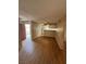 Spacious living area with wood-look floors that connects seamlessly to the kitchen at 2750 S Durango Dr # 1080, Las Vegas, NV 89117