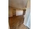 Bright living room with wood-look floors and a ceiling fan offers a comfortable living space at 2750 S Durango Dr # 1080, Las Vegas, NV 89117