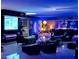Living room with bar, fireplace, sectional, and large screen television at 2777 Paradise Rd # 1801, Las Vegas, NV 89109