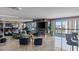 Spacious living room with marble floors, modern decor, and city views from the large windows at 2777 Paradise Rd # 1801, Las Vegas, NV 89109