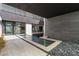 Modern home with a water feature, pebble landscaping and sleek design at 2787 La Bella Ct, Henderson, NV 89052