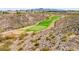 Desert home backing to a golf course provides scenic views and recreational opportunities at 2787 La Bella Ct, Henderson, NV 89052