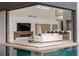 Living room opens to the indoor-outdoor pool area, with an open floor plan at 2787 La Bella Ct, Henderson, NV 89052