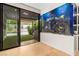 Home office adjacent to outdoor area, featuring a large aquarium adding a unique design element at 2787 La Bella Ct, Henderson, NV 89052