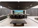 Entertain with this outdoor bar featuring a waterfall backdrop and ample seating at 2787 La Bella Ct, Henderson, NV 89052