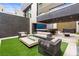 Enjoy outdoor living with a fire pit, outdoor bar, and hot tub at 2787 La Bella Ct, Henderson, NV 89052