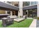 Enjoy outdoor living in this private courtyard with a fire pit and comfortable seating at 2787 La Bella Ct, Henderson, NV 89052