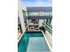 Amazing home showcasing an elegant pool that extends under the home providing a modern design element at 2787 La Bella Ct, Henderson, NV 89052
