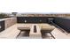 Chic rooftop deck featuring sun loungers and fire pit with panoramic city views at 2787 La Bella Ct, Henderson, NV 89052