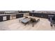 Outdoor kitchen, sun loungers, and firepit on this luxurious rooftop patio with a view at 2787 La Bella Ct, Henderson, NV 89052