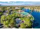Aerial view of a community featuring a lake, beach, and park at 3125 N Buffalo Dr # 1091, Las Vegas, NV 89128