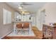 Cozy kitchen offers a breakfast bar, modern appliances, and a view to dining room at 3125 N Buffalo Dr # 1091, Las Vegas, NV 89128