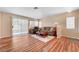 Bright living room featuring hardwood floors, comfortable seating, and ample natural light at 3125 N Buffalo Dr # 1091, Las Vegas, NV 89128