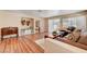 Cozy living room with hardwood floors, stylish decor, and view to the next room at 3125 N Buffalo Dr # 1091, Las Vegas, NV 89128