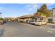 Street parking in a community with mature trees and landscaping at 3125 N Buffalo Dr # 1091, Las Vegas, NV 89128