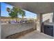 Outdoor patio with desert landscaping overlooking a parking area at 3125 N Buffalo Dr # 1091, Las Vegas, NV 89128