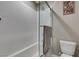 Clean bathroom featuring a shower with white subway tiles and a modern toilet at 3217 Bertonico Ave, Henderson, NV 89044