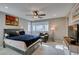 Spacious bedroom with ceiling fan and natural light and neutral carpeting at 3217 Bertonico Ave, Henderson, NV 89044