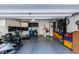 Organized two-car garage with epoxy floors, storage solutions, and space for vehicles and hobbies at 3217 Bertonico Ave, Henderson, NV 89044