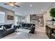 The open concept living area flows into the kitchen and dining area, perfect for entertaining at 3217 Bertonico Ave, Henderson, NV 89044