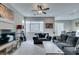 The living room offers a comfortable sitting area with large windows and modern furnishings at 3217 Bertonico Ave, Henderson, NV 89044