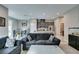 Open-concept living room with views to kitchen and adjacent breakfast nook at 3217 Bertonico Ave, Henderson, NV 89044