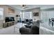 The living room features a comfortable sitting area, TV and views of the outdoor space at 3217 Bertonico Ave, Henderson, NV 89044