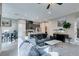Open-concept layout seamlessly connects the living room to the kitchen with ample light at 3217 Bertonico Ave, Henderson, NV 89044