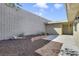 Backyard with concrete tiles, garden, and landscaping at 3371 Royce Ct, Las Vegas, NV 89121