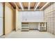 Basement workshop features a workbench, pegboard, and ample storage shelves at 3371 Royce Ct, Las Vegas, NV 89121