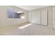 Bedroom with tiled floors and sliding closet doors at 3371 Royce Ct, Las Vegas, NV 89121