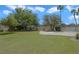 Lawn and picnic area with trees and lounge chairs for homeowners to enjoy time outside at 3371 Royce Ct, Las Vegas, NV 89121