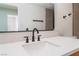 Bathroom vanity featuring a quartz countertop, modern fixtures, and sleek hardware at 3409 El Cortez Ave, Las Vegas, NV 89102