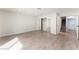 Spacious bedroom with sleek floors, mirrored closet doors, recessed lighting, and a doorway to the upstairs hallway at 3409 El Cortez Ave, Las Vegas, NV 89102