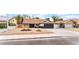 Charming single-story home with a well-manicured front yard and a spacious driveway at 3409 El Cortez Ave, Las Vegas, NV 89102