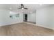 Bright and airy living room featuring sleek floors, recessed lighting, and an open layout with views to other living areas at 3409 El Cortez Ave, Las Vegas, NV 89102
