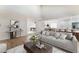 Open-concept living room showcases modern furnishings, wood floors, and seamless flow to kitchen at 3409 El Cortez Ave, Las Vegas, NV 89102