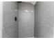 Modern shower featuring gray subway tile and modern fixtures, a stylish and functional space at 3409 El Cortez Ave, Las Vegas, NV 89102