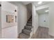 Hallway showcasing a carpeted staircase and nearby doorway leading to a living area at 3409 El Cortez Ave, Las Vegas, NV 89102