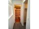 Well-lit bathroom featuring hard wood floors, shower and a closet at 3550 Bay Sands Dr # 2016, Laughlin, NV 89029