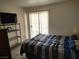Comfortable bedroom with a sliding glass door for lots of natural light at 3550 Bay Sands Dr # 2016, Laughlin, NV 89029