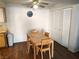 Bright dining area with wood floors, table with seating for four, and closet at 3550 Bay Sands Dr # 2016, Laughlin, NV 89029