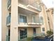 Three story condominium featuring balconies with metal railings and textured facade at 3550 Bay Sands Dr # 2016, Laughlin, NV 89029